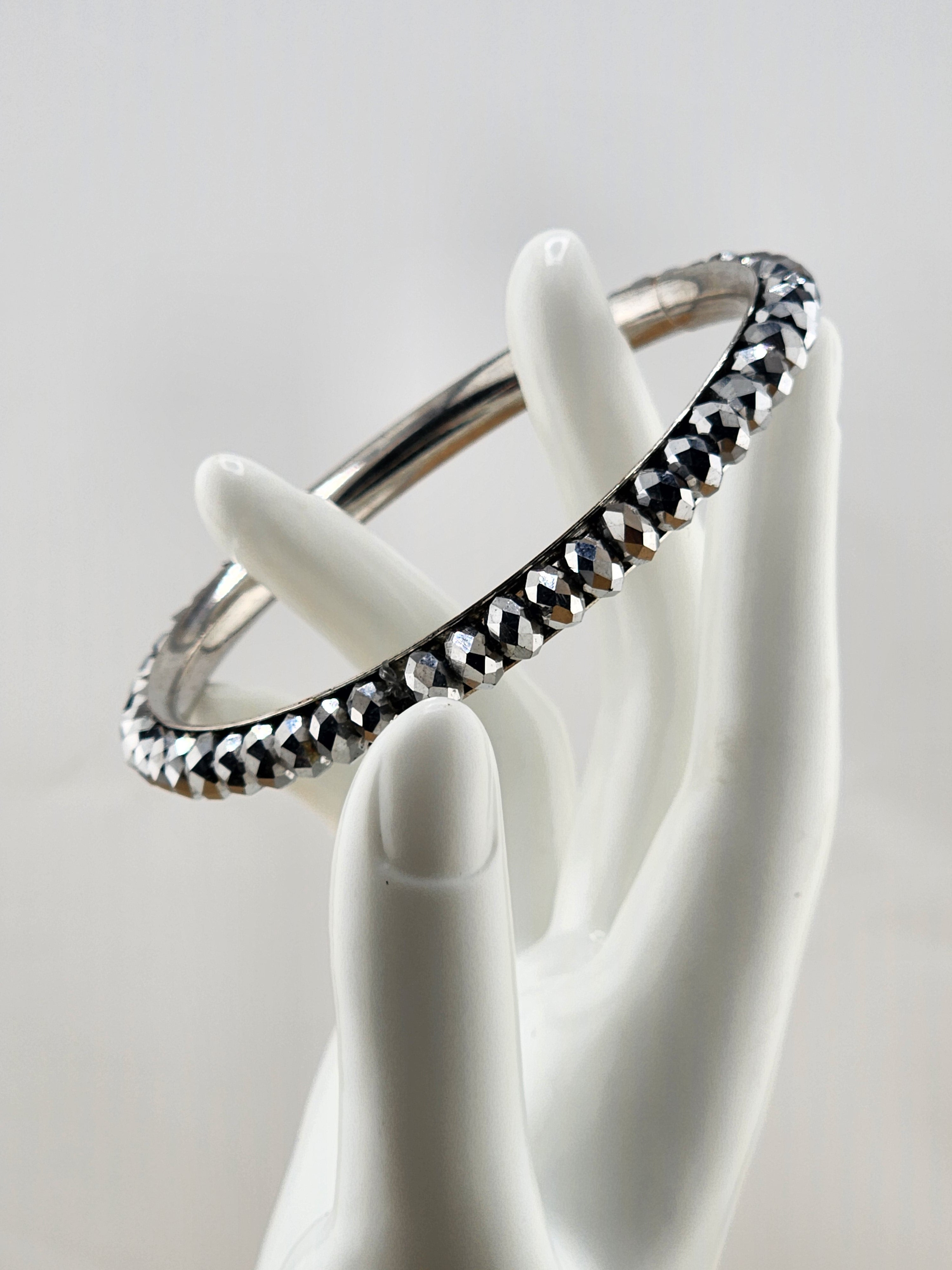 8.25in Silver Tone Faceted Crystal Bangle Bracelet - C03